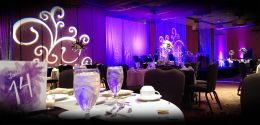 venue with fancy tables and purple lights